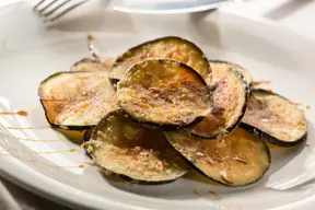 Berenjenas al horno con miel y pimienta