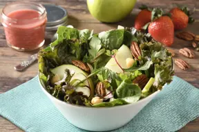 Ensalada con cítricos frutos secos y queso feta