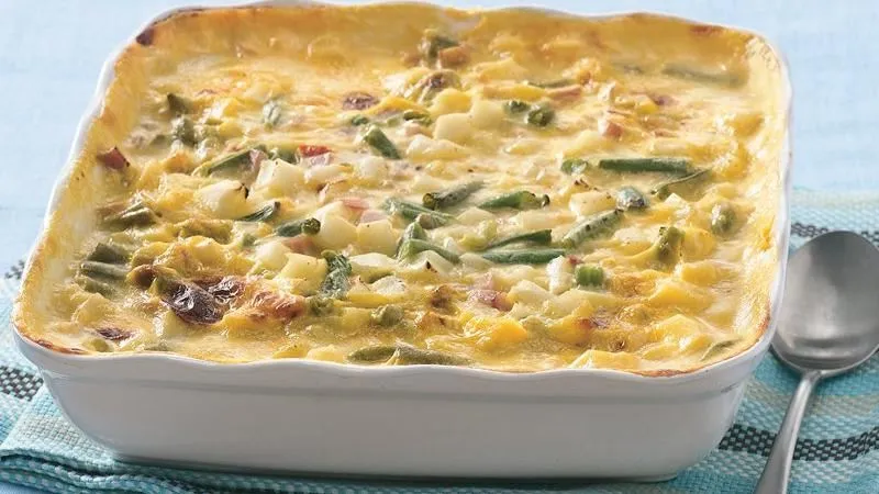 Puré de papas con jamón ahumando al gratén