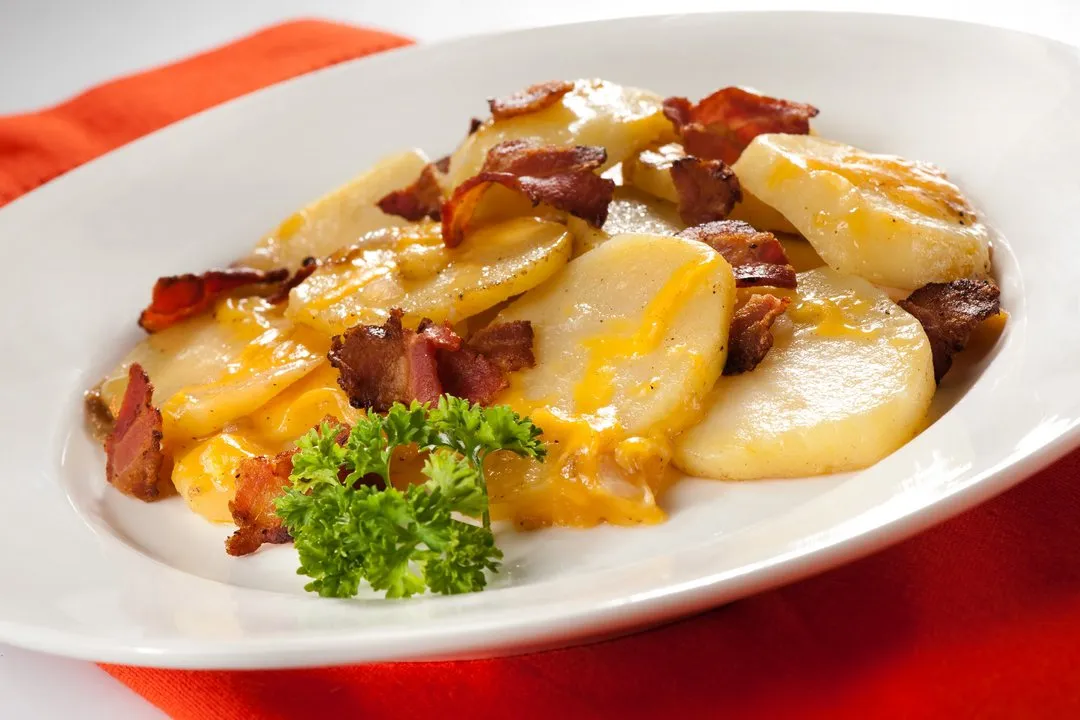 Asado de papas, cebolla y tocineta